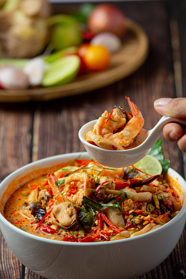 thai food; tom yum kung or river prawn spicy soup